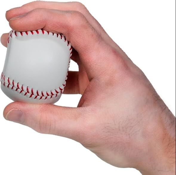 Changeup grip on baseball spinner